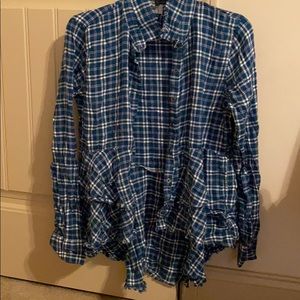 A blouse that goes good with leggings and boots.